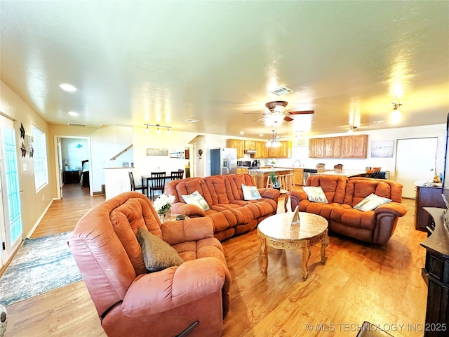114537 Spring Creek Rd, Eufaula, OK 74432 - living room featuring light wood-type flooring, ceiling fan, and recessed lighting