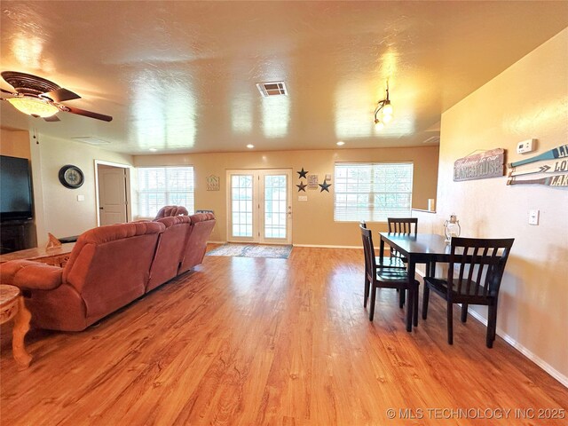 114537 Spring Creek Rd, Eufaula, OK 74432 - dining area featuring light wood-style floors, baseboards, and ceiling fan