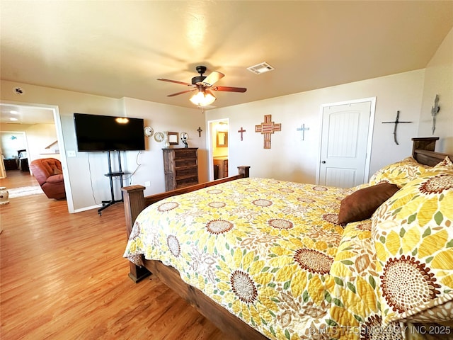114537 Spring Creek Rd, Eufaula, OK 74432 - bedroom with light wood finished floors and ceiling fan