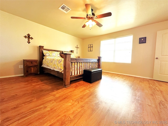 114537 Spring Creek Rd, Eufaula, OK 74432 - bedroom featuring light wood finished floors, baseboards, lofted ceiling, and a ceiling fan