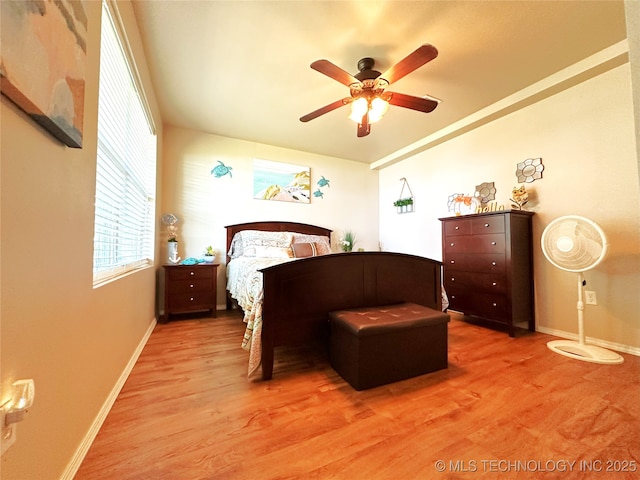 114537 Spring Creek Rd, Eufaula, OK 74432 - bedroom with light wood-type flooring, baseboards, and a ceiling fan