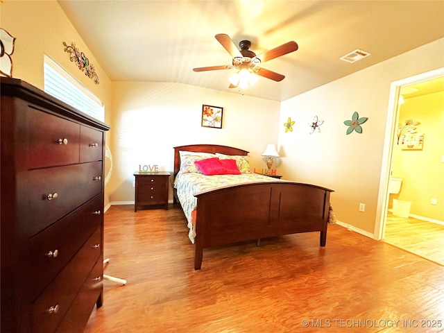 114537 Spring Creek Rd, Eufaula, OK 74432 - bedroom with light wood-type flooring, baseboards, connected bathroom, and a ceiling fan