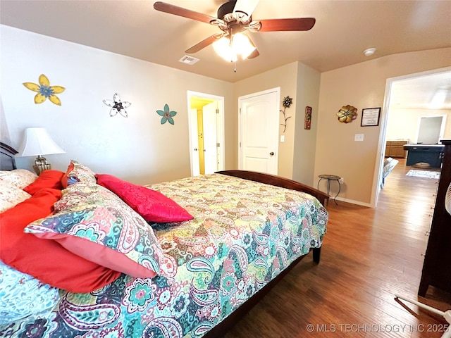 114537 Spring Creek Rd, Eufaula, OK 74432 - bedroom featuring wood finished floors, baseboards, and ceiling fan