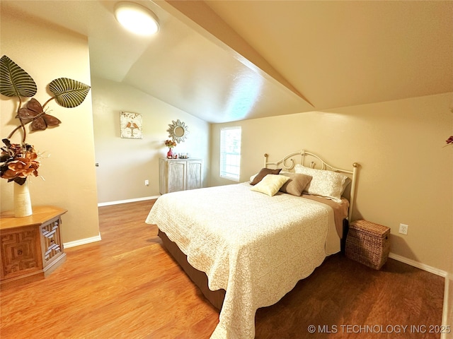 114537 Spring Creek Rd, Eufaula, OK 74432 - bedroom featuring lofted ceiling, light wood-style flooring, and baseboards