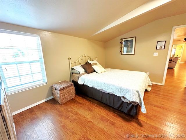 114537 Spring Creek Rd, Eufaula, OK 74432 - bedroom with lofted ceiling, light wood-style flooring, and baseboards
