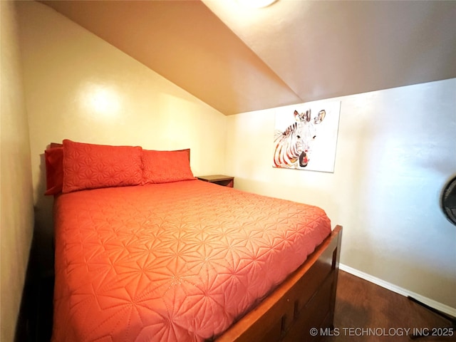 114537 Spring Creek Rd, Eufaula, OK 74432 - bedroom featuring dark wood finished floors, lofted ceiling, and baseboards