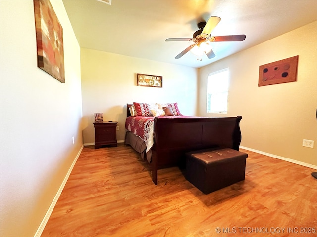 114537 Spring Creek Rd, Eufaula, OK 74432 - bedroom with light wood-style flooring, baseboards, and ceiling fan