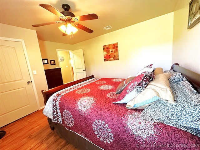 114537 Spring Creek Rd, Eufaula, OK 74432 - bedroom featuring wood finished floors and a ceiling fan