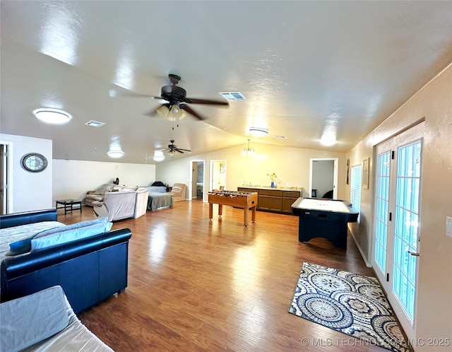 114537 Spring Creek Rd, Eufaula, OK 74432 - rec room with vaulted ceiling, wood finished floors, healthy amount of natural light, and a ceiling fan