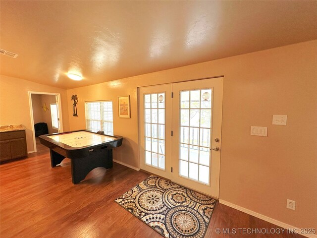 114537 Spring Creek Rd, Eufaula, OK 74432 - rec room with wood finished floors and baseboards