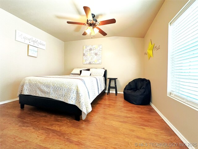 114537 Spring Creek Rd, Eufaula, OK 74432 - bedroom with baseboards, ceiling fan, and light wood-style floors