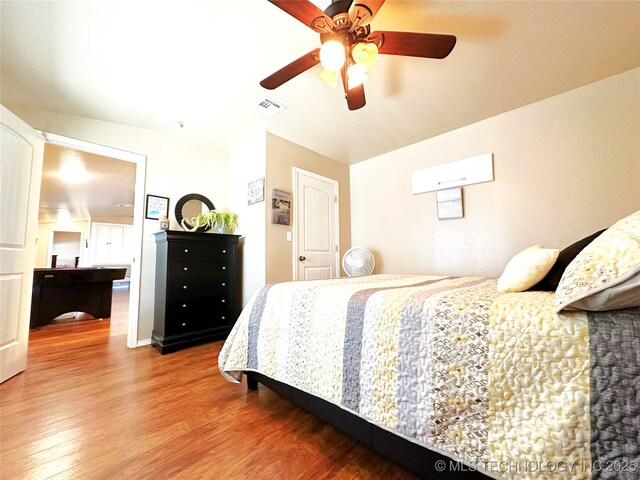 114537 Spring Creek Rd, Eufaula, OK 74432 - bedroom with wood finished floors and ceiling fan
