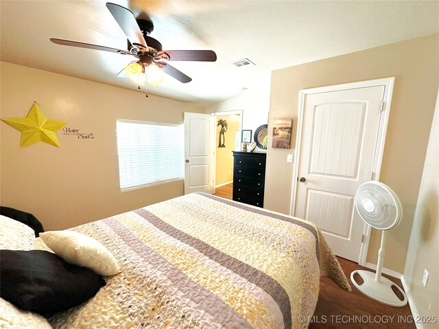 114537 Spring Creek Rd, Eufaula, OK 74432 - bedroom with baseboards, lofted ceiling, and a ceiling fan
