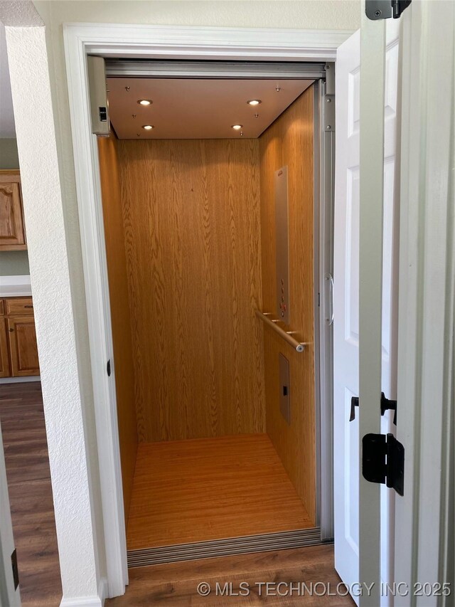 174550 N 4430th Rd N, Nashoba, OK 74558 - elevator with wood finished floors and recessed lighting