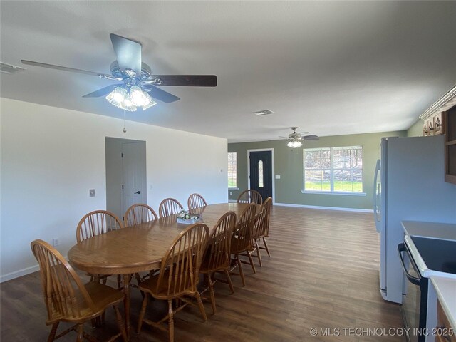 174550 N 4430th Rd N, Nashoba, OK 74558 - dining area featuring ceiling fan, wood finished floors, and baseboards