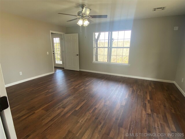174550 N 4430th Rd N, Nashoba, OK 74558 - empty room with ceiling fan, baseboards, and dark wood-style floors