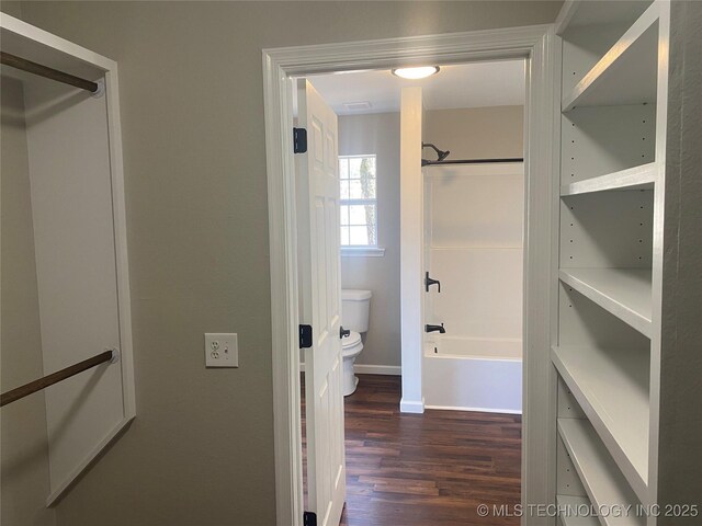 174550 N 4430th Rd N, Nashoba, OK 74558 - bathroom with toilet, wood finished floors, baseboards, and shower / bathtub combination