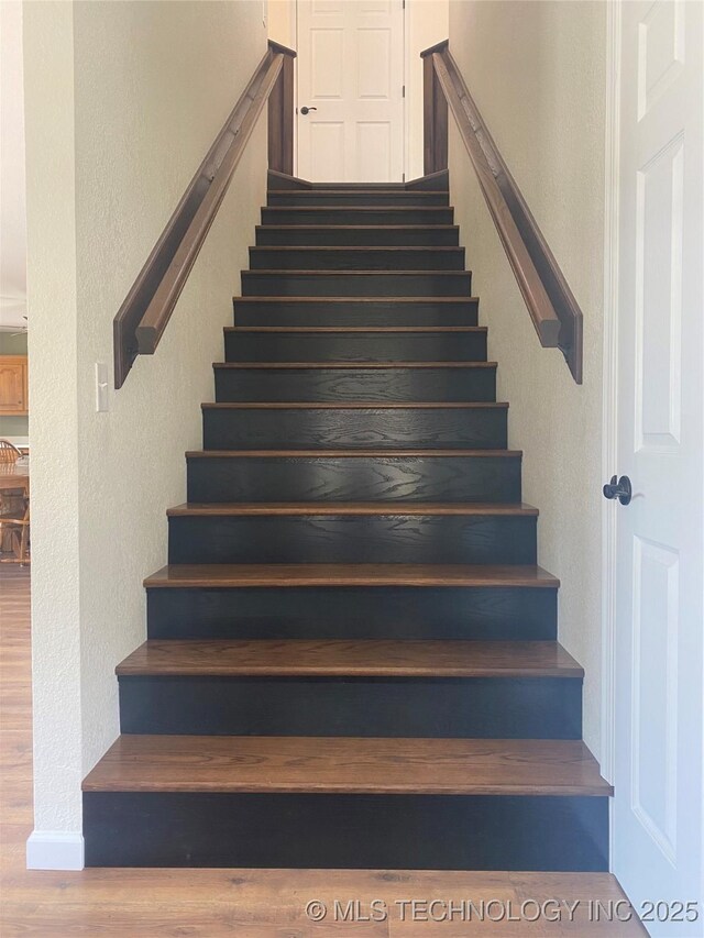 174550 N 4430th Rd N, Nashoba, OK 74558 - staircase featuring a textured wall and wood finished floors