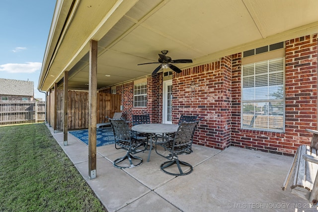 view of patio / terrace with ceiling fan and outdoor dining area