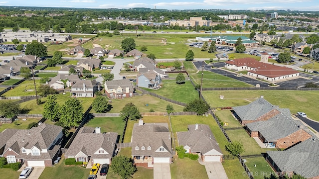 aerial view of property's location with nearby suburban area
