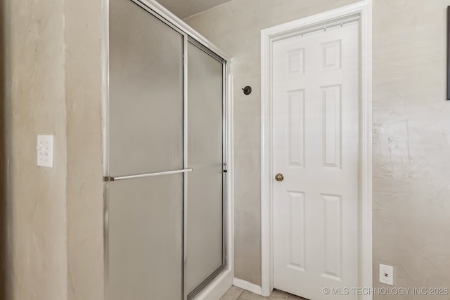 bathroom with a stall shower