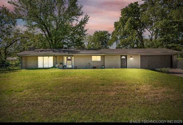 1014 SE 3rd St, Wagoner, OK 74467 - view of front of house with an attached garage