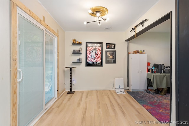 1014 SE 3rd St, Wagoner, OK 74467 - corridor with light wood-type flooring and baseboards