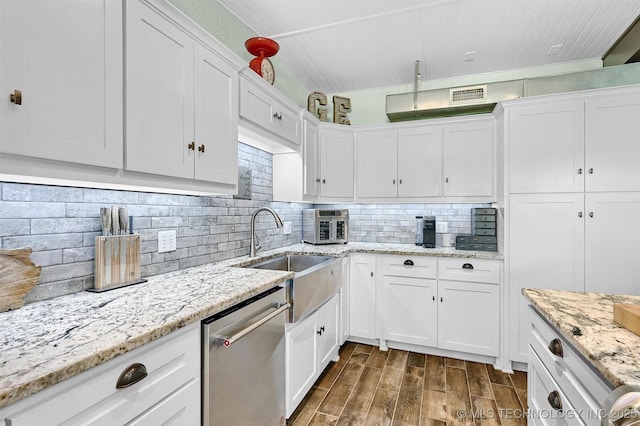 17983 Nuttin Ln, Madill, OK 73446 - kitchen featuring dishwasher, a sink, and white cabinets
