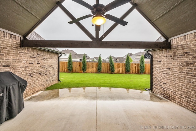 view of patio / terrace featuring ceiling fan and grilling area