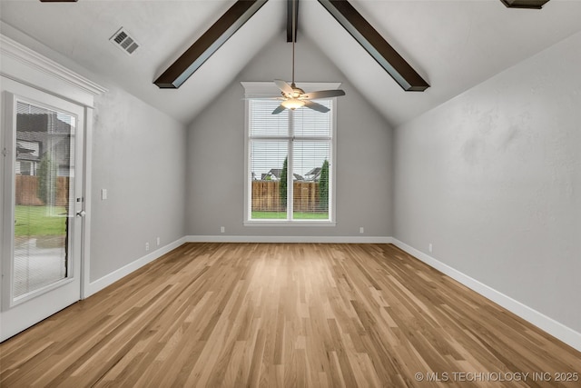 unfurnished living room featuring light wood-style flooring, baseboards, and a ceiling fan