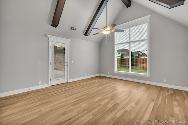 unfurnished living room featuring ceiling fan, light wood-style floors, and baseboards