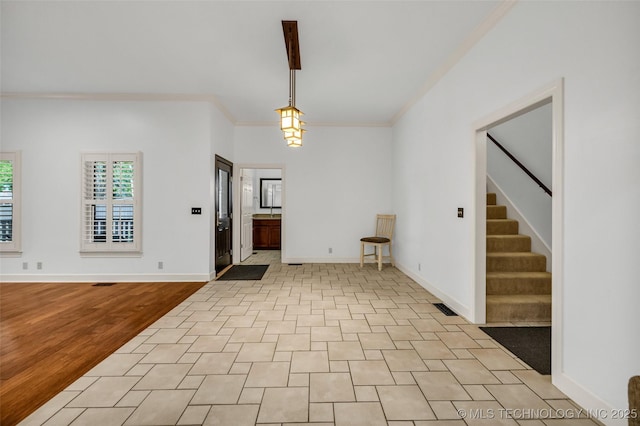 9304 E 113th St S, Bixby, OK 74008 - empty room featuring crown molding, stairs, and light wood finished floors