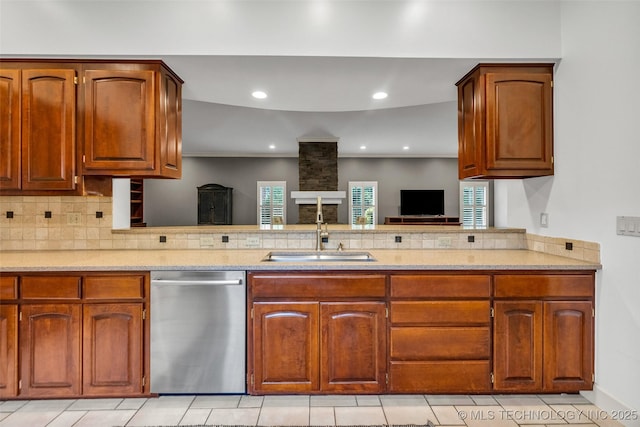 9304 E 113th St S, Bixby, OK 74008 - kitchen with stainless steel dishwasher, healthy amount of natural light, backsplash, a peninsula, and recessed lighting