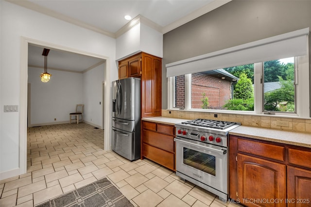 9304 E 113th St S, Bixby, OK 74008 - kitchen with appliances with stainless steel finishes, ornamental molding, tasteful backsplash, light countertops, and brown cabinetry