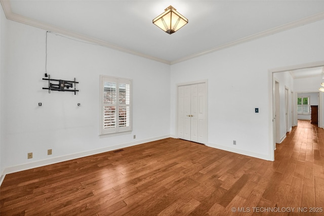 9304 E 113th St S, Bixby, OK 74008 - empty room featuring hardwood / wood-style flooring and crown molding
