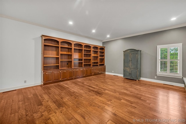9304 E 113th St S, Bixby, OK 74008 - unfurnished room featuring crown molding, wood finished floors, and recessed lighting