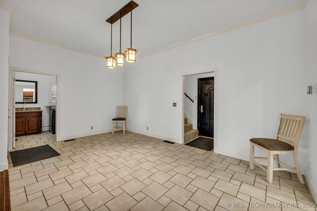 9304 E 113th St S, Bixby, OK 74008 - spare room featuring ornamental molding and stairway