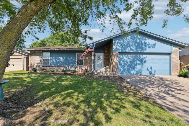view of front of property with brick siding, a garage, driveway, and a front lawn