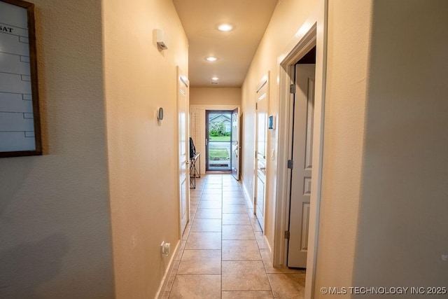14708 E 108th St N, Owasso, OK 74055 - hall featuring light tile patterned flooring, recessed lighting, and baseboards