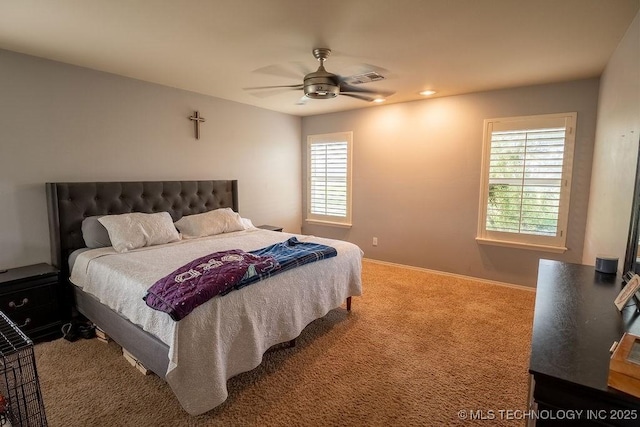 14708 E 108th St N, Owasso, OK 74055 - bedroom with multiple windows, carpet floors, ceiling fan, and baseboards