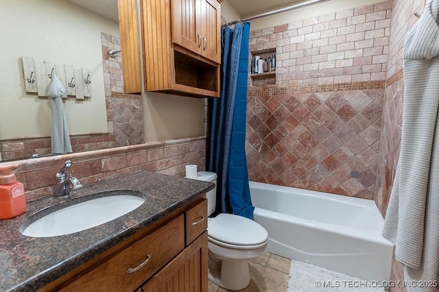 14708 E 108th St N, Owasso, OK 74055 - full bath with tile patterned flooring, toilet, tile walls, shower / tub combo, and vanity