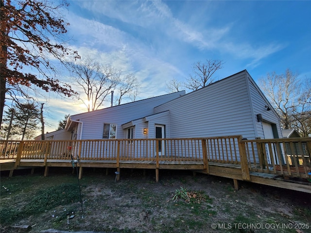 14360 County Road 3505th Loop, Ada, OK 74820 - rear view of property featuring a wooden deck and an attached garage