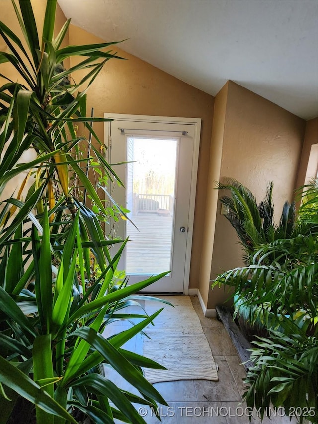14360 County Road 3505th Loop, Ada, OK 74820 - doorway to outside with lofted ceiling