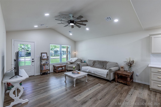 living area with a ceiling fan, lofted ceiling, wood finished floors, recessed lighting, and baseboards