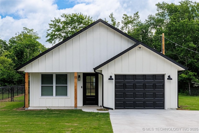 view of front of property featuring driveway, a garage, and board and batten siding