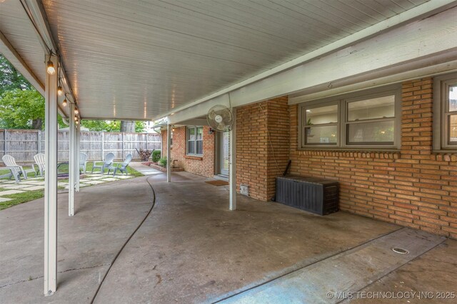 view of patio with fence