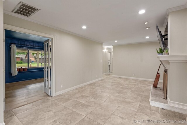below grade area with ornamental molding, recessed lighting, and baseboards