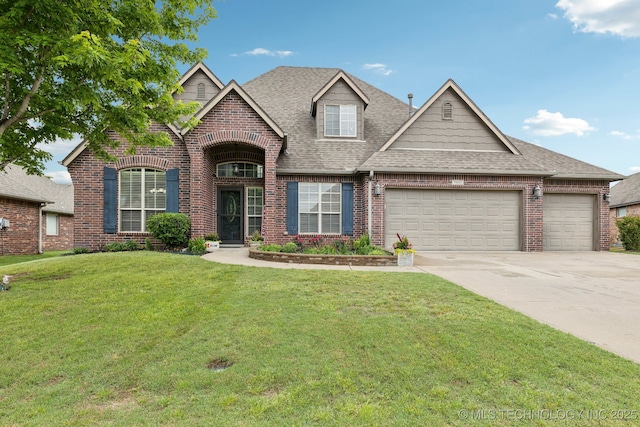 9401 N 95th E Pl, Owasso, OK 74055 - view of front of home featuring brick siding, an attached garage, a shingled roof, and a front yard