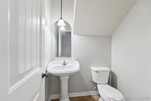 9401 N 95th E Pl, Owasso, OK 74055 - half bath featuring baseboards, toilet, and tile patterned floors