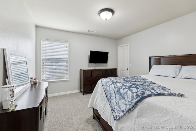 9401 N 95th E Pl, Owasso, OK 74055 - bedroom featuring light carpet and baseboards